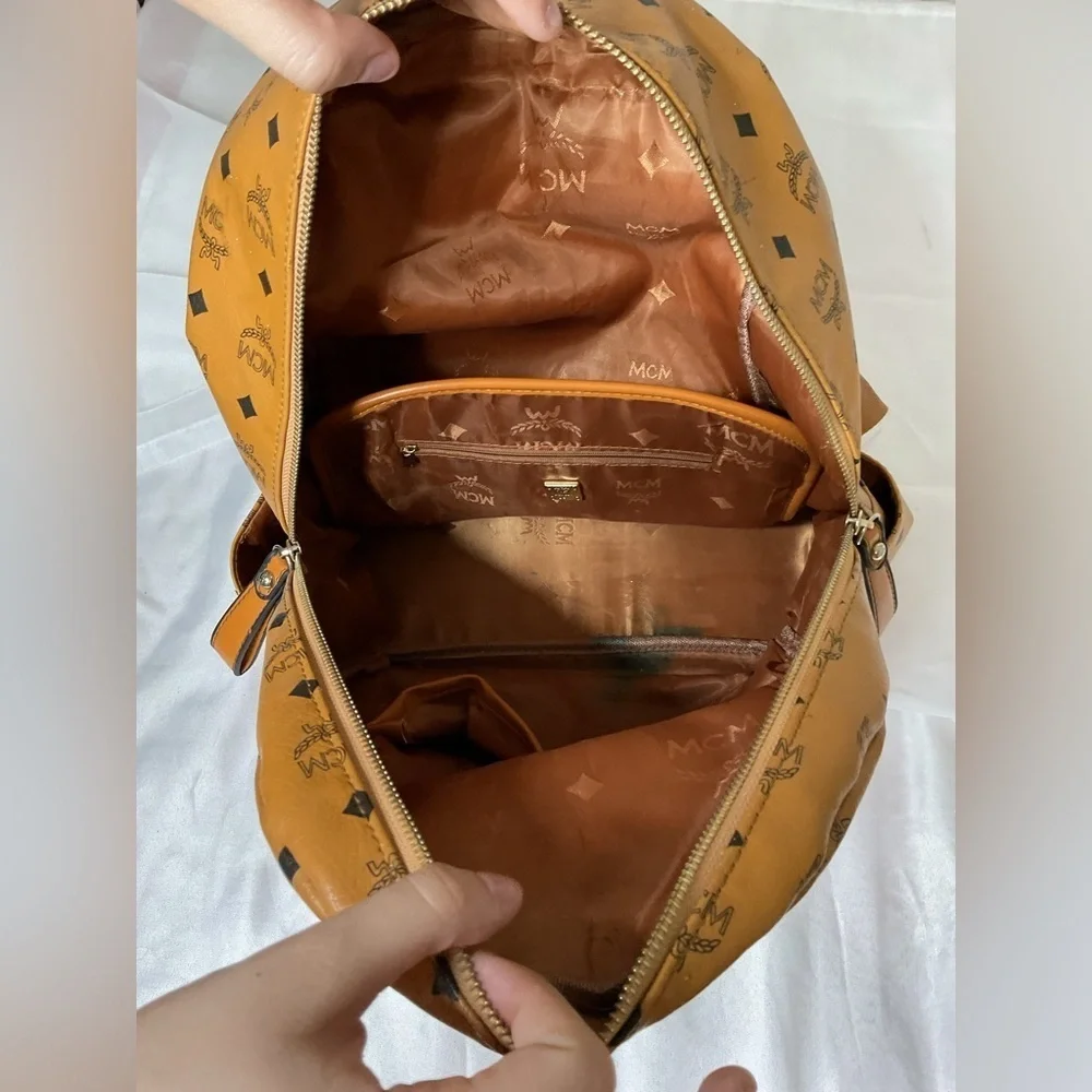 MCM Tan Backpack with Iconic Monogram Design